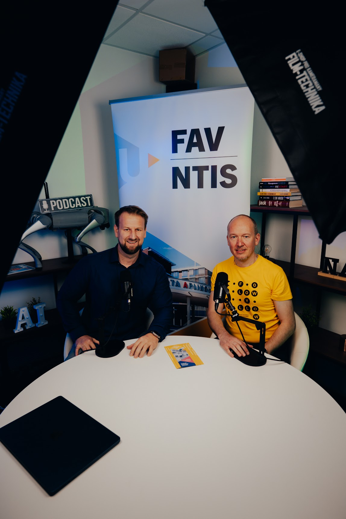 Jan Švec and Jakub Baxa seated at microphones during the recording of the Naučíme AI podcast in České Budějovice